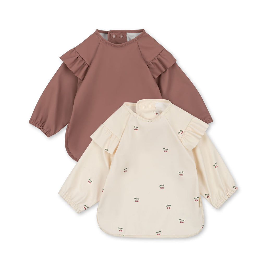 Konges Slojd - set van 2 slabbetjes met mouwen en ruches, Slabbetjes, Konges Slojd, Keekabuu